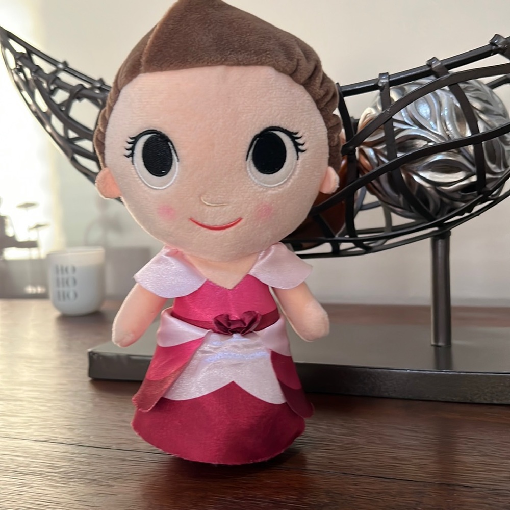 9 inches tall, polyester fiber, plastic pellets Hermione plushie